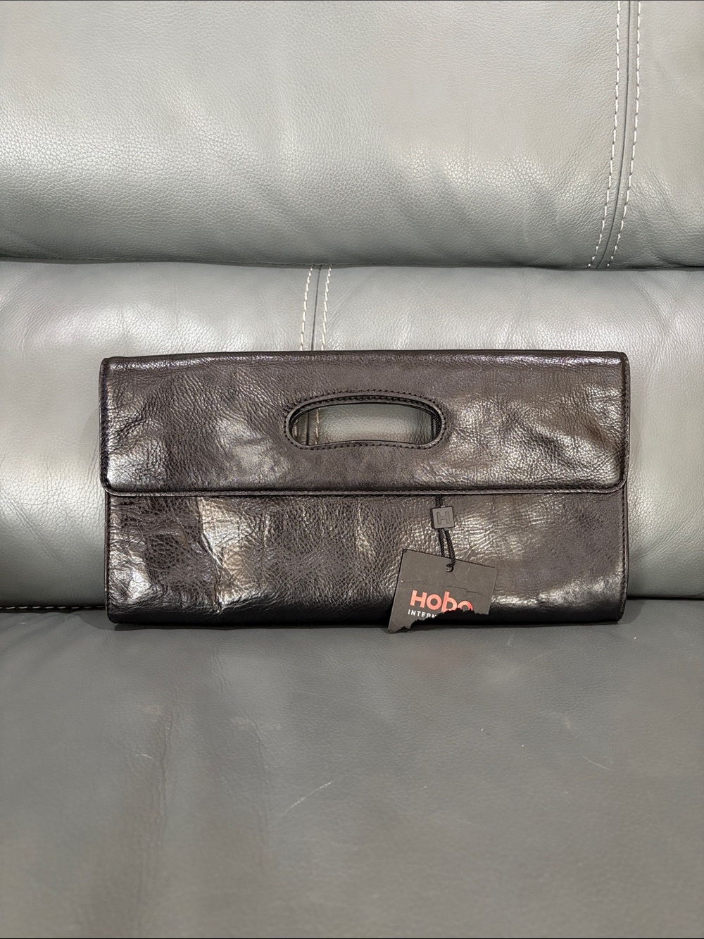 HOBO Glossy Black Leather Fold-Over Clutch